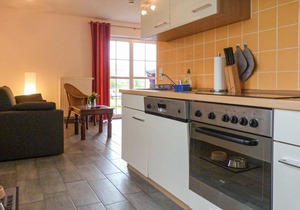 "Between the Baltic Sea beach and the Bodden, the Boddenhus apartment house awaits you with its brig
