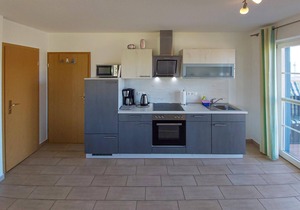 "Between the Baltic Sea beach and the Bodden, the Boddenhus apartment house awaits you with its brig