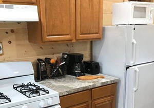 Brand New Beach Front Cottage, located on 4th Lake, walking distance to town.