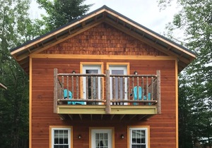 Brand New Beach Front Cottage, located on 4th Lake, walking distance to town.