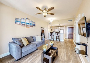 Bright condo with lagoon pool, hot tub, golf, private W/D & central AC