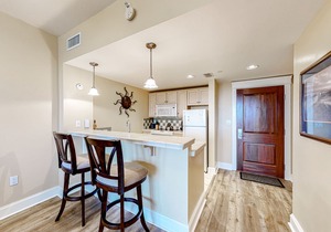 Bright condo with lagoon pool, hot tub, golf, private W/D & central AC