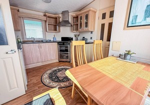 Brilliant 6 berth caravan for hire with decking by the Norfolk Coast ref 50064G