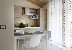 Bungalow in Caorle with garden furniture
