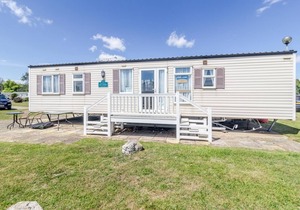 By the seaside dog friendly caravan at Haven Hopton in Norfolk ref 80015W