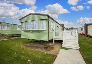 Caravan with decking at Highfield Grange Holiday Park in Essex ref 26260E