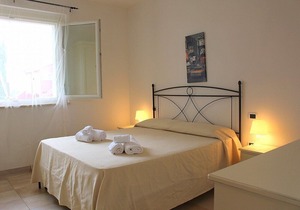 Casa Aliade C, fully refundable with voucher*: A welcoming apartment that is part of a villa surrounded by the greenery.