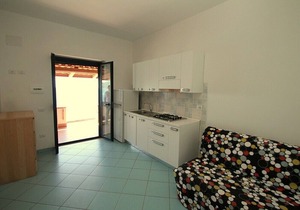 Casa Panna A: A cheerful apartment that is part of a small villa located right on the beach, with Free WI-FI.