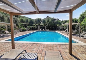 Casa Raissa D: A characteristic and welcoming apartment that is part of a villa immersed in a splendid landscape, in a lovely little hamlet, with Free WI-FI.