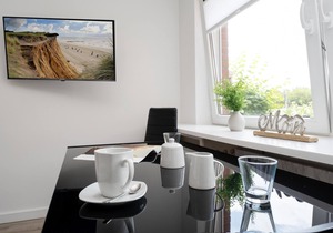 Central app. for 2 persons, WLAN and TV, separate kitchen.
