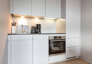 Central. Harmonious. Design. - New center