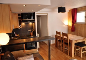 Charming apartment at the foot of the slopes. South-facing balcony. Private parking lot