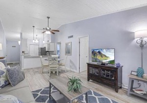 Charming condo with two pools and steps to beach