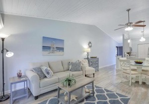 Charming condo with two pools and steps to beach
