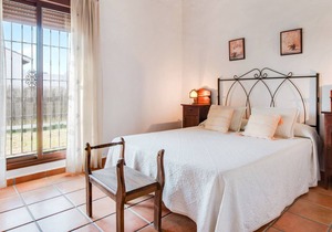 Charming Holiday Home “Cortijo El Refugio 2” with Terrace, Garden & Shared Pool