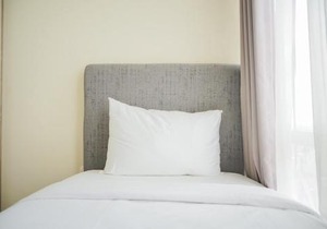 Chic and Cozy 2BR Apartment at Menteng Park By Travelio