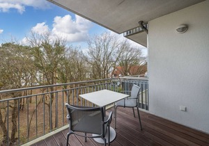 Chic Baltic Sea apartment close to the beach with balcony, wood-burning stove and underfloor heating