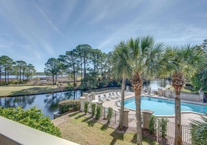 Coastal Charm with Lake and Golf Course View, Pool, Tram to Beach and Wharf.