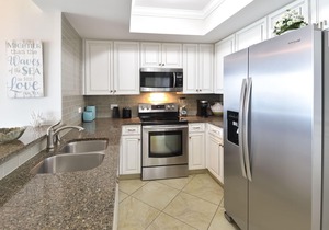 Coastal chic beachfront condo w/updates & private balcony!