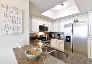 Coastal chic beachfront condo w/updates & private balcony!