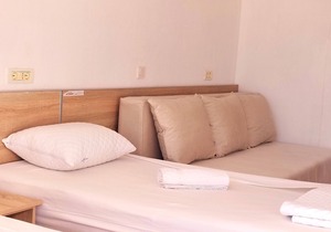 Comfy twin room with separated beds, double sofa bed - sea view balcony