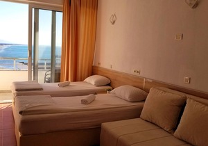 Comfy twin room with separated beds, double sofa bed - sea view balcony