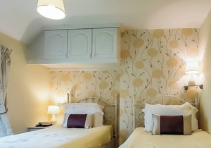 Cottage with two doubles and one twin.