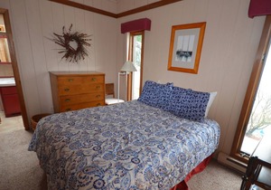 Cozy cottage style home on East Grand Traverse Bay in Elk Rapids. A/C.