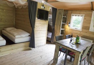 Cozy tentlodge with roofed terrace in a green area