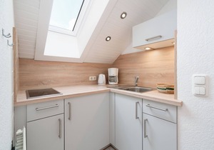 Cozy top floor apartment with small balcony and sea view in Pelzerhaken