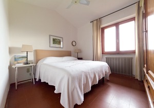 Designer villa with splendid bay view of Punta Ala, two terraces and garden.