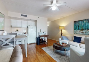 Dog-friendly downtown condo with riverfront balcony - walk to shops & eateries
