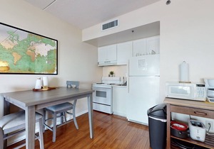 Dog-friendly downtown condo with riverfront balcony - walk to shops & eateries