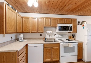 Dog-friendly, lake-view condo with pool, hot tub & nearby beach - near parks