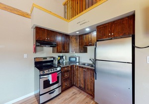 Dog-friendly lakefront wilderness resort cabin with deck, WiFi, & full kitchen