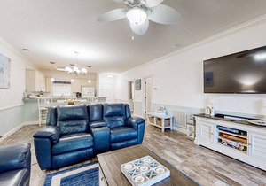 Dual-suite Magnolia Pointe condo with golf, pools, and screened patio
