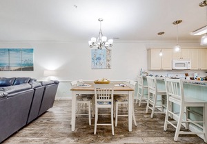 Dual-suite Magnolia Pointe condo with golf, pools, and screened patio