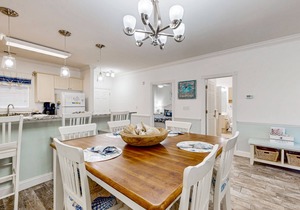Dual-suite Magnolia Pointe condo with golf, pools, and screened patio