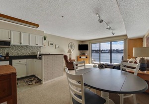 Edgewater Inn 115 | Sunrise Over Lake Charlevoix | Pool, Hot Tub, Sauna