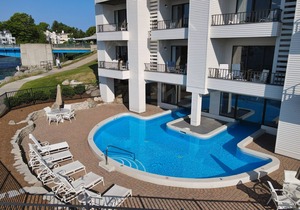 Edgewater Inn 115 | Sunrise Over Lake Charlevoix | Pool, Hot Tub, Sauna