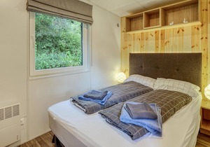 Enjoy a real Tiny Haus vacation close to nature at Camping Park Wemding!