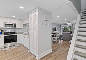 Enjoy a walk to the beach from this renovated, pet friendly end-unit villa.