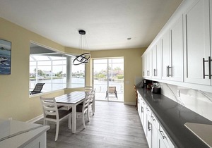 Enjoy Sunny warm days, lounging poolside at this home