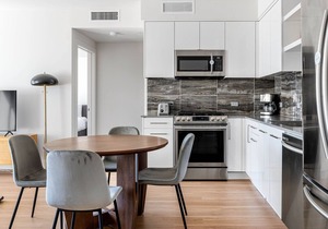 Epic Oakland 2BR w/AC, W/D, Sky Deck, next to BART, by Blueground