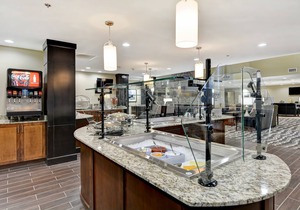 Equipped Queen Studio | Free Breakfast, Business Center + Fitness Center Access