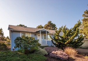Explore Beverly Beach in this charming three bedroom moments from the beach!