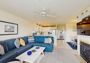 Family-friendly condo with beach access, pools, covered deck, W/D & AC
