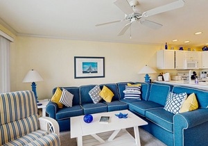 Family-friendly condo with beach access, pools, covered deck, W/D & AC