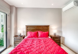 First-floor condo in Jacó w/ terrace, shared pool - near to the beach!