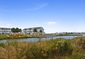 FREE DAILY ACTIVITIES INCLUDED! Only a few miles from Bethany Beach this beautifully decorated second floor unit offers 2 bedrooms with 2 full baths and is nestled within unspoiled land and gently lapping inland waterways